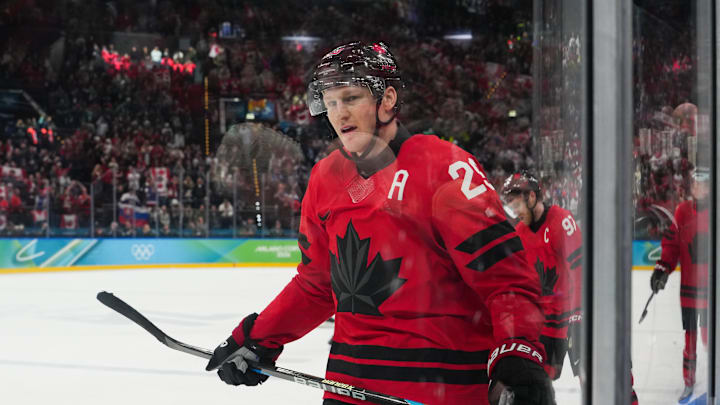 Feb 20, 2026; Milan, Italy; Nathan MacKinnon (29) of Canada celebrates after scoring a goal during the third period against Finland in a men's ice hockey semifinal during the Milano Cortina 2026 Olympic Winter Games at Milano Santagiulia Ice Hockey Arena. Mandatory Credit: James Lang-Imagn Images