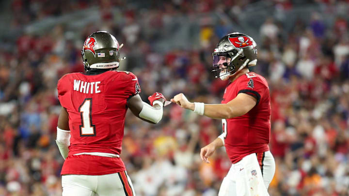 Oct 21, 2024; Tampa, Florida, USA; Tampa Bay Buccaneers running back Rachaad White (1) and quarterback Baker Mayfield (6) celebrate after a touchdown against the Baltimore Ravens in the fourth quarter at Raymond James Stadium. Mandatory Credit: Nathan Ray Seebeck-Imagn Images Oct 21, 2024; Tampa, Florida, USA; Tampa Bay Buccaneers running back Rachaad White (1) and quarterback Baker Mayfield (6) celebrate after a touchdown against the Baltimore Ravens in the fourth quarter at Raymond James Stadium. Mandatory Credit: Nathan Ray Seebeck-Imagn Images