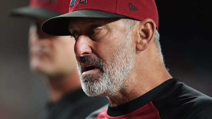 Arizona Diamondbacks manager Torey Lovullo talks to his team in the dugout as they play against the San Diego Padres at Chase Field on Aug. 4, 2025.