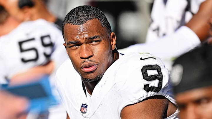 Oct 22, 2023; Chicago, Illinois, USA;  Las Vegas Raiders defensive end Tyree Wilson (9) takes a breather on the sidelines against the Chicago Bears at Soldier Field. Mandatory Credit: Jamie Sabau-Imagn Images