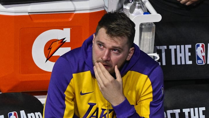 Apr 9, 2025; Dallas, Texas, USA; Los Angeles Lakers guard Luka Doncic (77) looks on as the Dallas Mavericks play a tribute video for Doncic before the game against the Lakers at the American Airlines Center. Mandatory Credit: Jerome Miron-Imagn Images