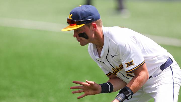 Jun 5, 2026; Morgantown, WV, USA; West Virginia Mountaineers infielder Brodie Kresser (12) field a ground ball during the sixth inning against the Cal Poly Mustangs at Kendrick Family Ballpark. Mandatory Credit: Ben Queen-Imagn Images Jun 5, 2026; Morgantown, WV, USA; West Virginia Mountaineers infielder Brodie Kresser (12) field a ground ball during the sixth inning against the Cal Poly Mustangs at Kendrick Family Ballpark. Mandatory Credit: Ben Queen-Imagn Images