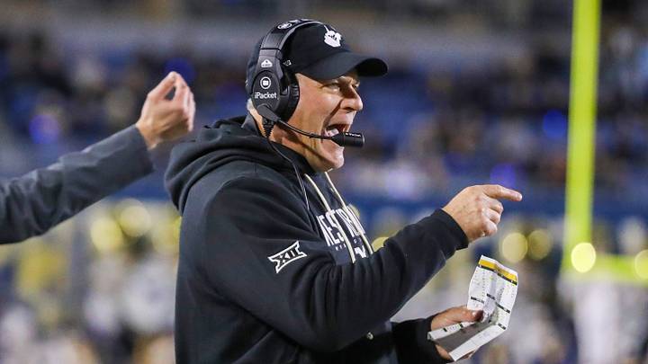 Oct 25, 2025; Morgantown, West Virginia, USA; West Virginia Mountaineers head coach Rich Rodriguez calls out a play during the third quarter against the Texas Christian University Horned Frogs at Milan Puskar Stadium. Mandatory Credit: Ben Queen-Imagn Images Oct 25, 2025; Morgantown, West Virginia, USA; West Virginia Mountaineers head coach Rich Rodriguez calls out a play during the third quarter against the Texas Christian University Horned Frogs at Milan Puskar Stadium. Mandatory Credit: Ben Queen-Imagn Images
