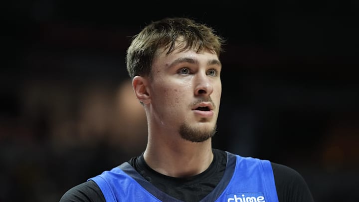Jul 12, 2025; Las Vegas, NV, USA; Dallas Mavericks forward Cooper Flagg (32) looks on against the San Antonio Spurs in the second quarter of their game at Thomas & Mack Center. Mandatory Credit: Candice Ward-Imagn Images Jul 12, 2025; Las Vegas, NV, USA; Dallas Mavericks forward Cooper Flagg (32) looks on against the San Antonio Spurs in the second quarter of their game at Thomas & Mack Center. Mandatory Credit: Candice Ward-Imagn Images