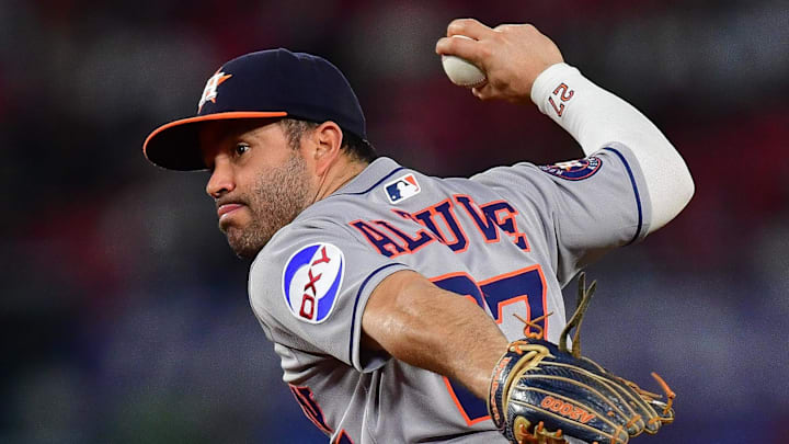 Sep 26, 2025; Anaheim, California, USA; Houston Astros second baseman Jose Altuve (27) throws to first for the out against Los Angeles Angels right fielder Jo Adell (7) during the sixth inning at Angel Stadium. Mandatory Credit: Gary A. Vasquez-Imagn Images Sep 26, 2025; Anaheim, California, USA; Houston Astros second baseman Jose Altuve (27) throws to first for the out against Los Angeles Angels right fielder Jo Adell (7) during the sixth inning at Angel Stadium. Mandatory Credit: Gary A. Vasquez-Imagn Images
