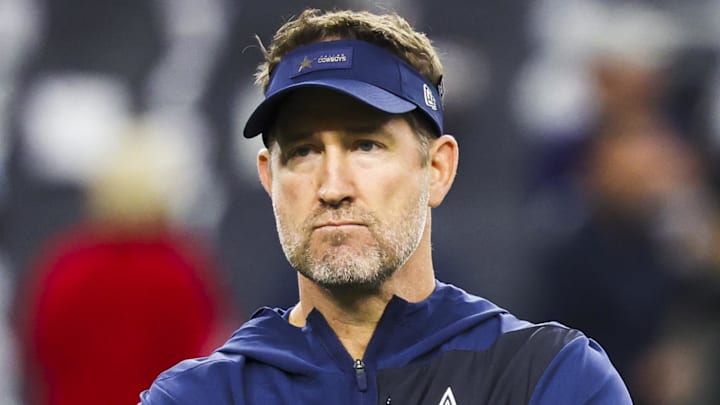 Dec 21, 2025; Arlington, Texas, USA; Dallas Cowboys head coach Brian Schottenheimer watches pregame warmups against the Los Angeles Chargers at AT&T Stadium. Mandatory Credit: Kevin Jairaj-Imagn Images