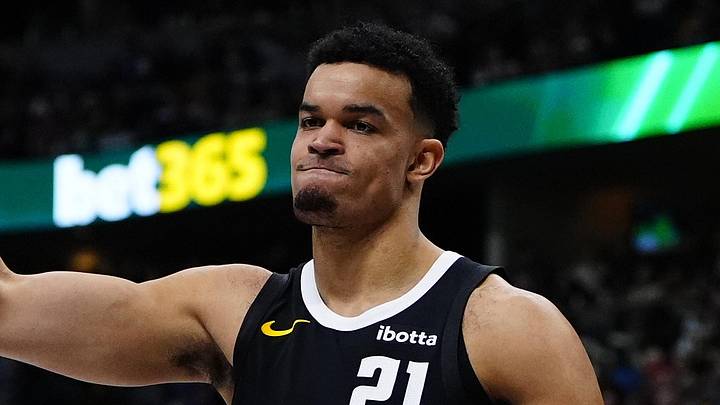 Dec 25, 2025; Denver, Colorado, USA; Denver Nuggets forward Spencer Jones (21) reacts against the Minnesota Timberwolves during the second half at Ball Arena. Mandatory Credit: Ron Chenoy-Imagn Images Dec 25, 2025; Denver, Colorado, USA; Denver Nuggets forward Spencer Jones (21) reacts against the Minnesota Timberwolves during the second half at Ball Arena. Mandatory Credit: Ron Chenoy-Imagn Images
