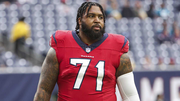 Nov 26, 2023; Houston, Texas, USA; Houston Texans offensive tackle Tytus Howard (71) walks off the field before the game against the Jacksonville Jaguars at NRG Stadium. Mandatory Credit: Troy Taormina-Imagn Images