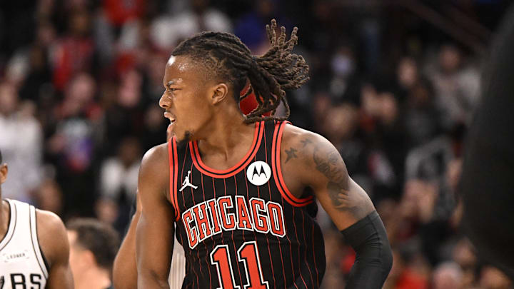 Nov 10, 2025; Chicago, Illinois, USA;  Chicago Bulls guard Ayo Dosunmu (11) after scoring against the San Antonio Spurs during the second half at the United Center. Mandatory Credit: Matt Marton-Imagn Images