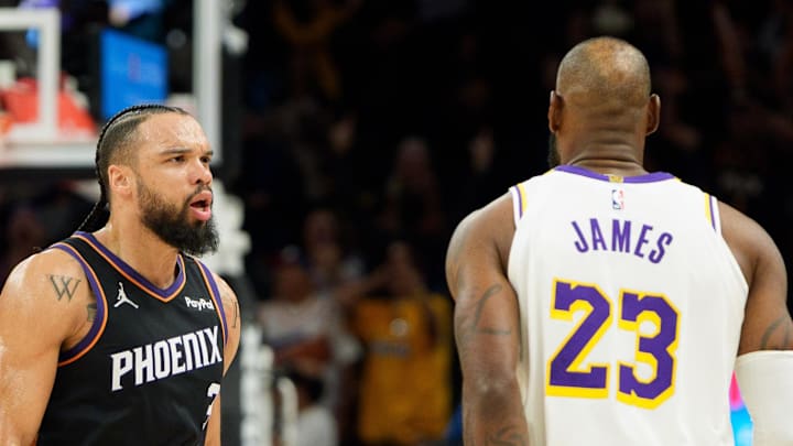 Dec 14, 2025; Phoenix, Arizona, USA; Phoenix Suns forward Dillon Brooks (3) and Los Angeles Lakers forward LeBron James (23) react during an altercation that resulted in a technical for Brooks during the second half of a game at at Mortgage Matchup Center. Mandatory Credit: Allan Henry-Imagn Images