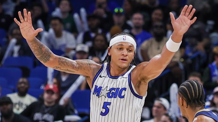 Jan 11, 2026; Orlando, Florida, USA; Orlando Magic forward Paolo Banchero (5) defends New Orleans Pelicans forward Trey Murphy III (25) during the second half at Kia Center. Mandatory Credit: Mike Watters-Imagn Images Jan 11, 2026; Orlando, Florida, USA; Orlando Magic forward Paolo Banchero (5) defends New Orleans Pelicans forward Trey Murphy III (25) during the second half at Kia Center. Mandatory Credit: Mike Watters-Imagn Images