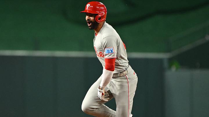 Jun 24, 2026; Washington, District of Columbia, USA; Philadelphia Phillies right fielder Derek Hill (49) reacts after hitting a two run home run against the Washington Nationals during the ninth inning at Nationals Park.