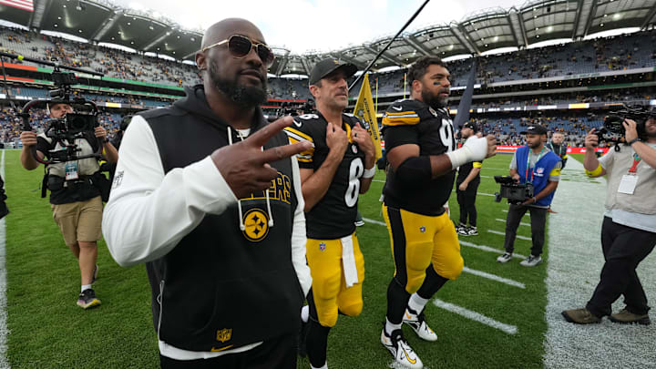 Sep 28, 2025; Dublin, Ireland; Pittsburgh Steelers coach Mike Tomlin (left), quarterback Aaron Rodgers (center) and defensive tackle Cameron Heyward (97) leave the field after an NFL International Series game against the Minnesota Vikings at Croke Park. Mandatory Credit: Kirby Lee-Imagn Images Sep 28, 2025; Dublin, Ireland; Pittsburgh Steelers coach Mike Tomlin (left), quarterback Aaron Rodgers (center) and defensive tackle Cameron Heyward (97) leave the field after an NFL International Series game against the Minnesota Vikings at Croke Park. Mandatory Credit: Kirby Lee-Imagn Images