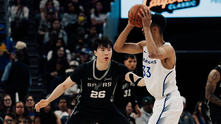 July 5, 2026; San Francisco, California, USA; Summer Spurs forward Hyunjung Lee (26) guards Golden State Warriors forward Malevy Leons (33) in the first half at the California Classic at Chase Center. July 5, 2026; San Francisco, California, USA; Summer Spurs forward Hyunjung Lee (26) guards Golden State Warriors forward Malevy Leons (33) in the first half at the California Classic at Chase Center.