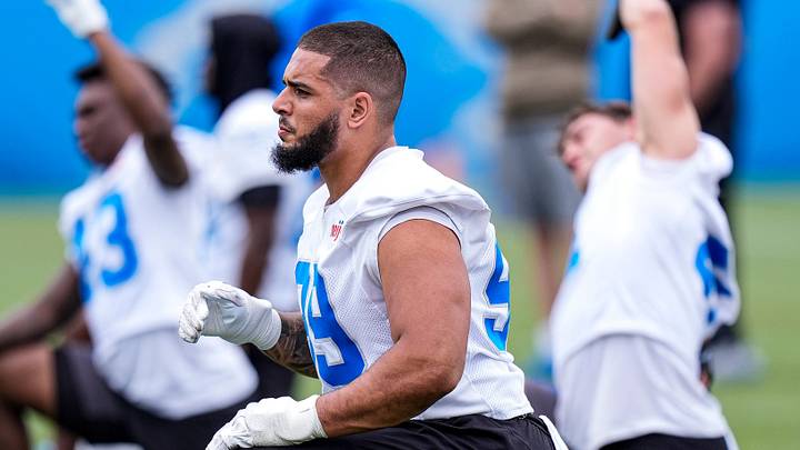 Detroit Lions defensive end Ahmed Hassanein (99) warms up during minicamp Detroit Lions defensive end Ahmed Hassanein (99) warms up during minicamp