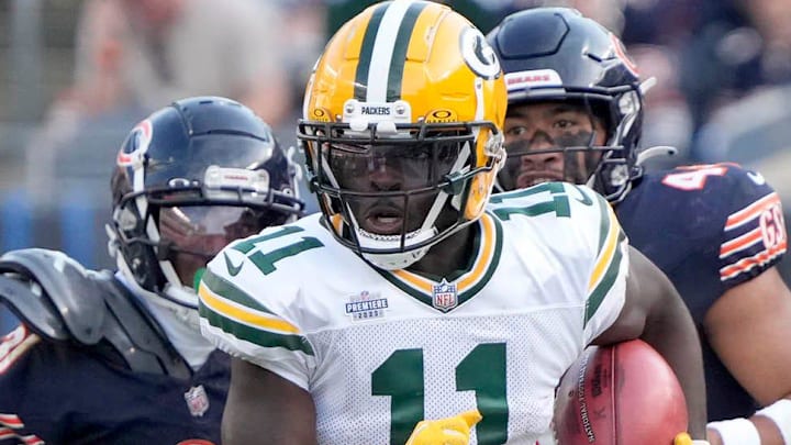 Green Bay Packers receiver Jayden Reed returns a punt against the Bears in 2023. Green Bay Packers receiver Jayden Reed returns a punt against the Bears in 2023.