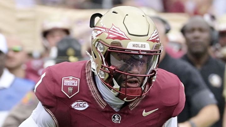 Aug 30, 2025; Tallahassee, Florida, USA; Florida State Seminoles quarterback Tommy Castellanos (1) runs for a touchdown against the Alabama Crimson Tide during the first half at Doak S. Campbell Stadium. Mandatory Credit: Melina Myers-Imagn Images