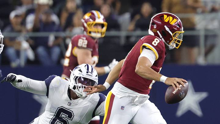Sep 20, 2026; Arlington, Texas, USA; Washington Commanders quarterback Marcus Mariota (8) scrambles against Dallas Cowboys linebacker Donovan Ezeiruaku (6) during the fourth quarter at AT&T Stadium. Mandatory Credit: Kevin Jairaj-Imagn Images Sep 20, 2026; Arlington, Texas, USA; Washington Commanders quarterback Marcus Mariota (8) scrambles against Dallas Cowboys linebacker Donovan Ezeiruaku (6) during the fourth quarter at AT&T Stadium. Mandatory Credit: Kevin Jairaj-Imagn Images