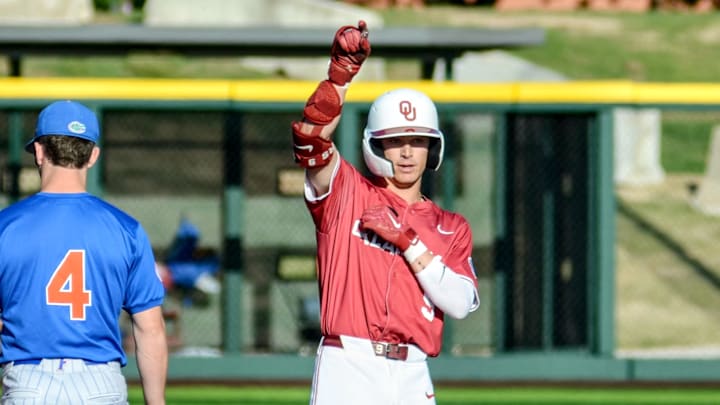 Oklahoma infielder Camden Johnson celebrates after reaching base against Florida.