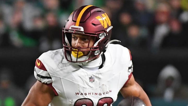 Nov 14, 2024; Philadelphia, Pennsylvania, USA; Washington Commanders running back Austin Ekeler (30) against the Philadelphia Eagles at Lincoln Financial Field. Mandatory Credit: Eric Hartline-Imagn Images