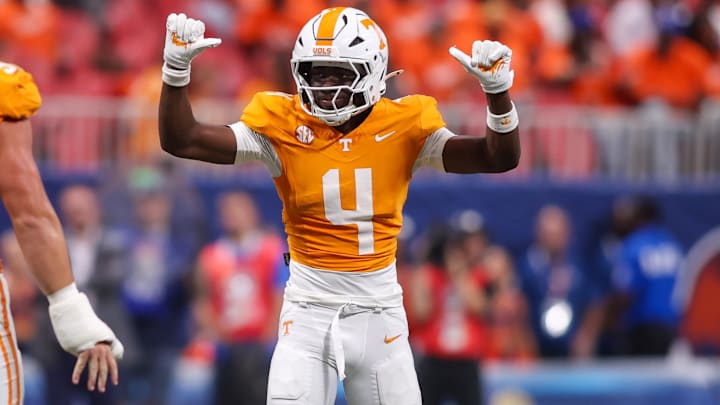 Aug 30, 2025; Atlanta, Georgia, USA; Tennessee Volunteers defensive back Ty Redmond (4) reacts after a stop against the Syracuse Orange in the second quarter at Mercedes-Benz Stadium. Mandatory Credit: Brett Davis-Imagn Images
