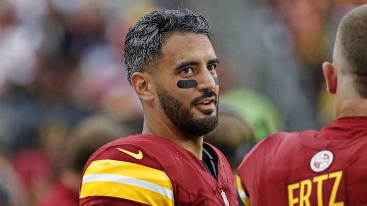 Sep 21, 2025; Landover, Maryland, USA; Washington Commanders quarterback Marcus Mariota (8) and Washington Commanders tight end Zach Ertz (86) react from the sidelines during the second half against the Las Vegas Raiders at Northwest Stadium. Mandatory Credit: Amber Searls-Imagn Images Sep 21, 2025; Landover, Maryland, USA; Washington Commanders quarterback Marcus Mariota (8) and Washington Commanders tight end Zach Ertz (86) react from the sidelines during the second half against the Las Vegas Raiders at Northwest Stadium. Mandatory Credit: Amber Searls-Imagn Images