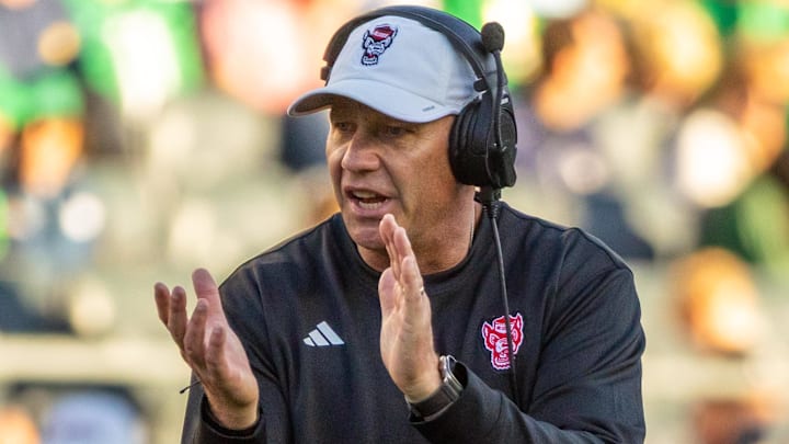 Oct 11, 2025; South Bend, Indiana, USA; NC State Wolfpack head coach Dave Doeren claps as he walks onto the field against the Notre Dame Fighting Irish during the second half at Notre Dame Stadium. Mandatory Credit: Michael Caterina-Imagn Images Oct 11, 2025; South Bend, Indiana, USA; NC State Wolfpack head coach Dave Doeren claps as he walks onto the field against the Notre Dame Fighting Irish during the second half at Notre Dame Stadium. Mandatory Credit: Michael Caterina-Imagn Images