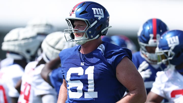 Jul 24, 2025; East Rutherford, NJ, USA; New York Giants center John Michael Schmitz Jr. (61) on the field during training camp at Quest Diagnostics Training Center. Mandatory Credit: Vincent Carchietta-Imagn Images