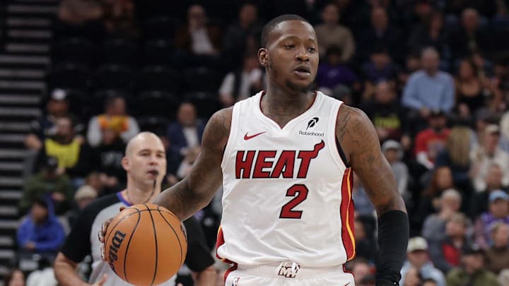 Jan 9, 2025; Salt Lake City, Utah, USA;  Miami Heat guard Terry Rozier (2) controls the ball during the first quarter against the Utah Jazz at Delta Center. Mandatory Credit: Chris Nicoll-Imagn Images