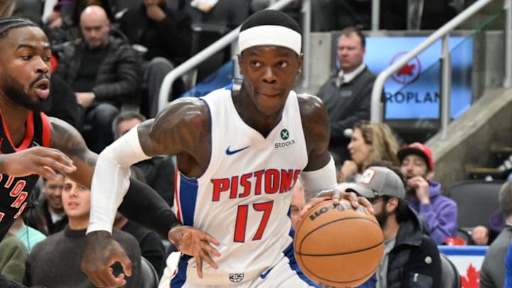 Apr 4, 2025; Toronto, Ontario, CAN;  Detroit Pistons guard Dennis Schroder (17) dribbles the ball past Toronto Raptors guard Jamal Shead (23) in the first half at Scotiabank Arena. Mandatory Credit: Dan Hamilton-Imagn Images