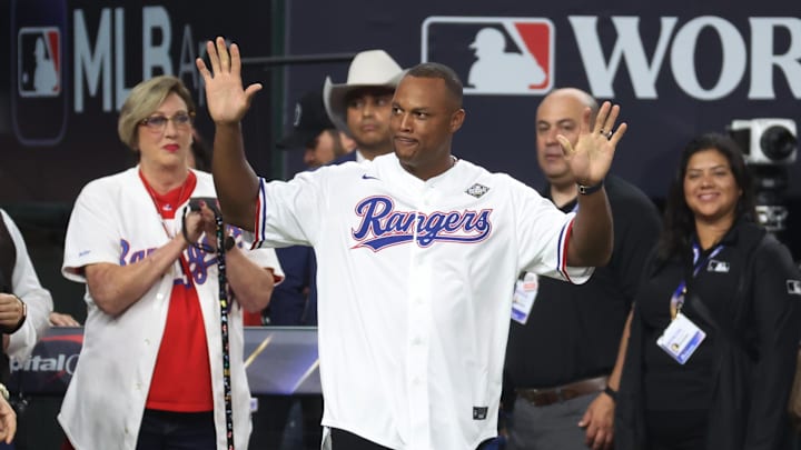 Oct 28, 2023; Arlington, TX, USA; Former Texas Rangers player Adrian Beltre walks to the mound to throw out the ceremonial first pitch before the game between the Texas Rangers and the Arizona Diamondbacks in game two of the 2023 World Series at Globe Life Field. 