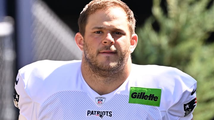 Jul 28, 2025; Foxborough, MA, USA; New England Patriots center Garrett Bradbury (65) heads to the practice fields for training camp at Gillette Stadium.