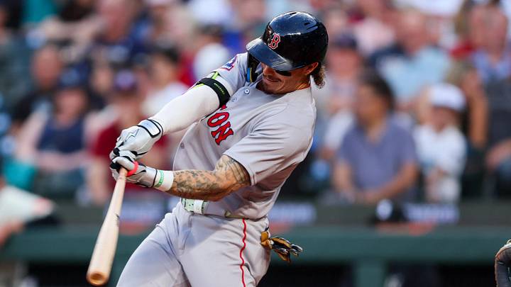 Jun 19, 2026; Seattle, Washington, USA;  Boston Red Sox outfielder Jarren Duran (16) hits a single in the sixth inning against the Seattle Mariners at T-Mobile Park. Mandatory Credit: Kevin Ng-Imagn Images