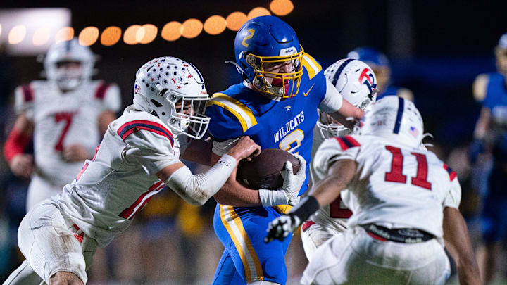DCA's Carson Sneed (2) runs after a catch with Tipton-Rosemark's Tanner Thornell (12) trying to tackle him during their Division II-A playoff game at Donelson Christian Academy in Nashville, Tenn., Friday, Nov. 8, 2024.