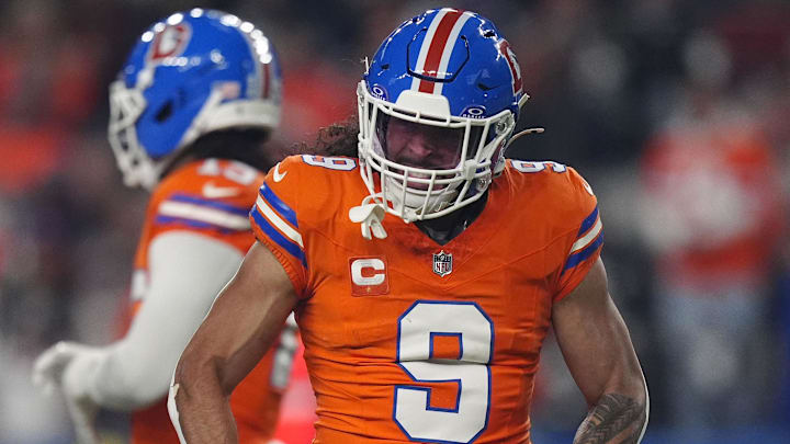 Nov 6, 2025; Denver, Colorado, USA; Denver Broncos safety Talanoa Hufanga (9) reacts against the Las Vegas Raiders during the first half at Empower Field at Mile High. 