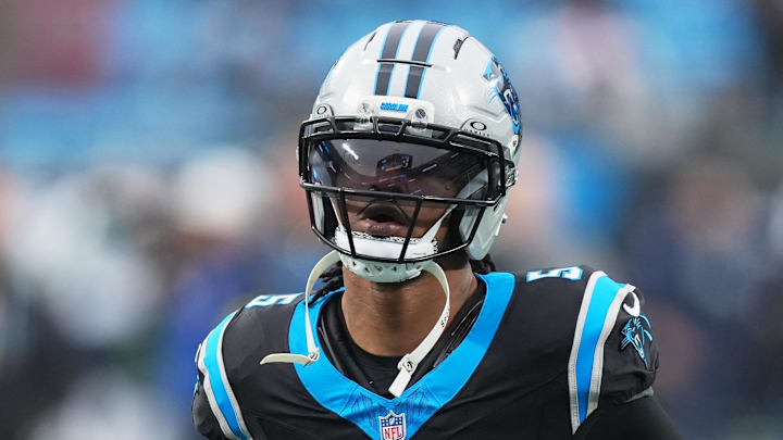 Dec 28, 2025; Charlotte, North Carolina, USA; Carolina Panthers running back Rico Dowdle (5) warms up before the game against the Seattle Seahawks at Bank of America Stadium. Mandatory Credit: Jim Dedmon-Imagn Images