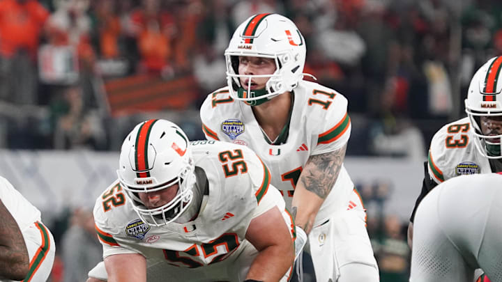 Miami quarterback Carson Beck (11) and the Hurricanes won against the Ohio State Buckeyes in the College Football Playoff quarterfinal, 24-14.