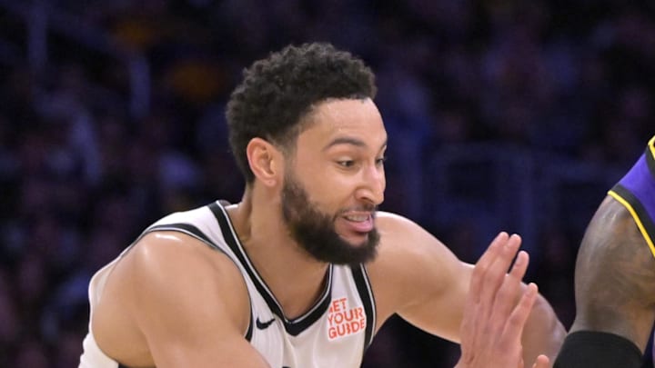 Jan 17, 2025; Los Angeles, California, USA;  Los Angeles Lakers forward LeBron James (23) is defended by Brooklyn Nets guard Ben Simmons (10) as he takes the ball down court in the second half at Crypto.com Arena. Mandatory Credit: Jayne Kamin-Oncea-Imagn Images