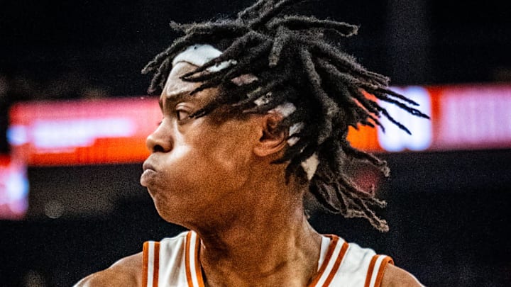Texas Longhorns guard Tre Johnson (20) brings the rebound down in the second half of the Longhorns' game against the Sooners at the Moody Center in Austin, March 8, 2025. Texas Longhorns guard Tre Johnson (20) brings the rebound down in the second half of the Longhorns' game against the Sooners at the Moody Center in Austin, March 8, 2025.