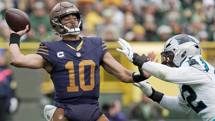 Green Bay Packers quarterback Jordan Love is pressured during last year's game against the Carolina Panthers. Green Bay Packers quarterback Jordan Love is pressured during last year's game against the Carolina Panthers.