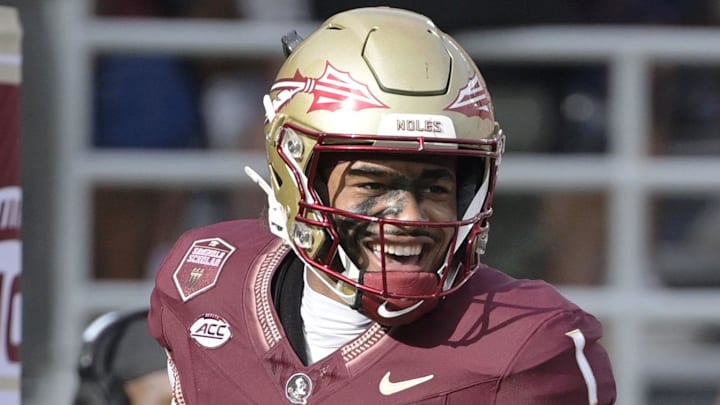 Aug 30, 2025; Tallahassee, Florida, USA; Florida State Seminoles quarterback Tommy Castellanos (1) celebrates with wide receiver Micahi Danzy (19) after a touchdown against the Alabama Crimson Tide during the second half at Doak S. Campbell Stadium. Mandatory Credit: Melina Myers-Imagn Images