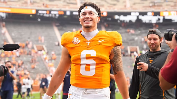 Tennessee quarterback Joey Aguilar (6) smiles as he walks off the field toward his family after Tennessee's home opener against ETSU at Neyland Stadium in Knoxville, Tenn., on Sept. 6, 2025.