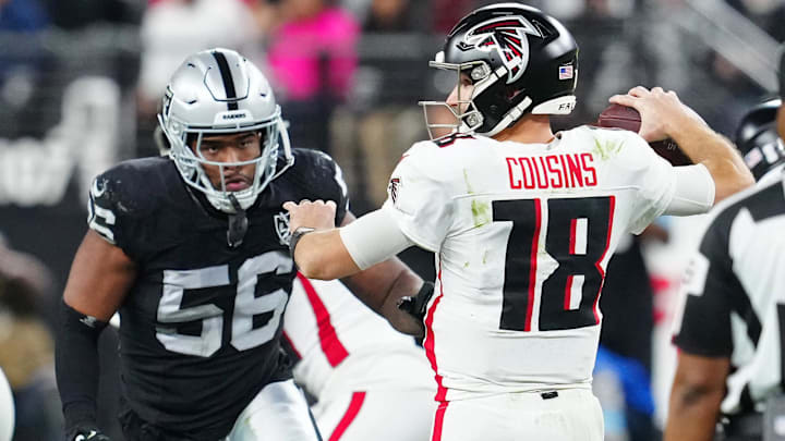 Dec 16, 2024; Paradise, Nevada, USA; Las Vegas Raiders linebacker Amari Burney (56) looks to sack Atlanta Falcons quarterback Kirk Cousins (18) during the third quarter at Allegiant Stadium. Mandatory Credit: Stephen R. Sylvanie-Imagn Images