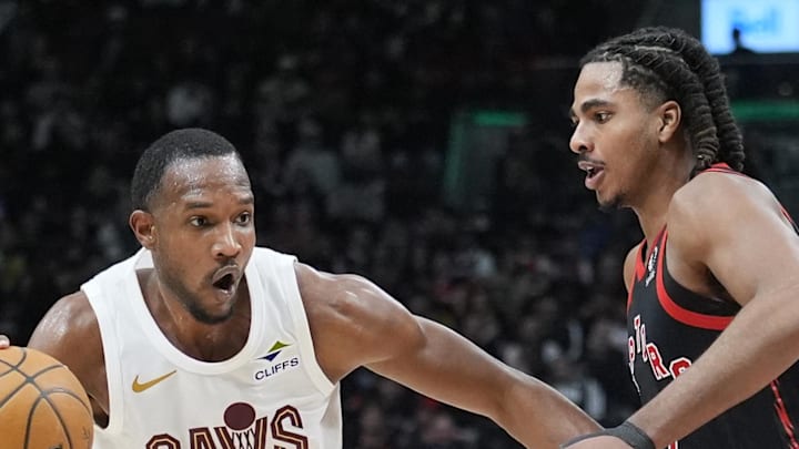 Cleveland Cavaliers forward Evan Mobley drives to the basket against Toronto Raptors forward Collin Murray-Boyles.