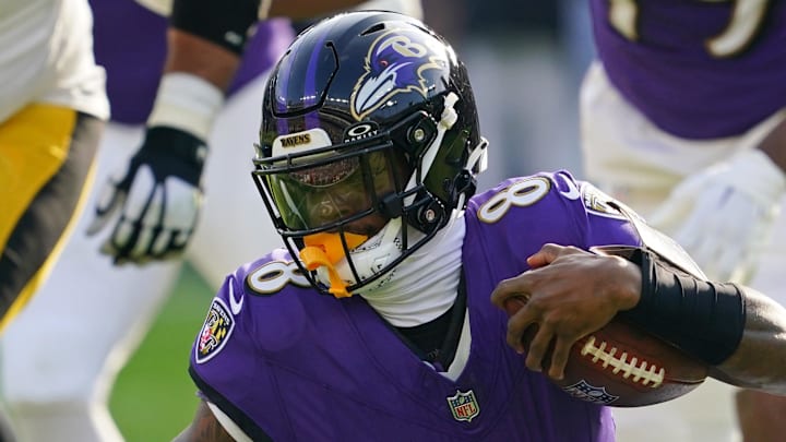 Pittsburgh Steelers cornerback Brandin Echols tackles Baltimore Ravens quarterback Lamar Jackson.