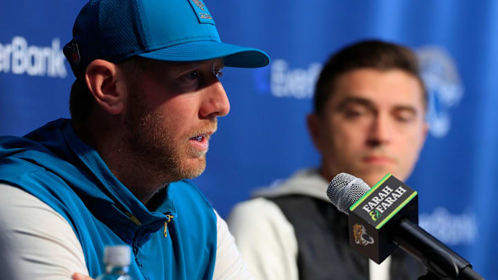 Jacksonville Jaguars head coach Liam Coen speaks during a press conference as general manager James Gladstone looks on at the Miller Electric Center, Wednesday, Jan. 14, 2026, in Jacksonville, Fla.