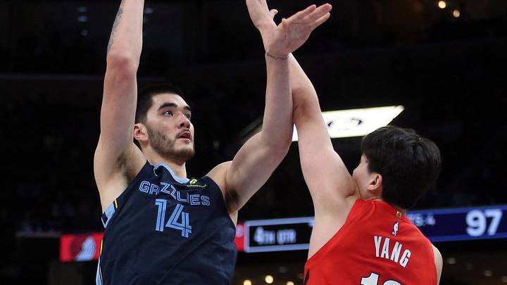 Dec 7, 2025; Memphis, Tennessee, USA; Memphis Grizzlies center Zach Edey (14) shoots as Portland Trail Blazers center Yang Hansen (16) defends during the fourth quarter at FedExForum. Mandatory Credit: Petre Thomas-Imagn Images Dec 7, 2025; Memphis, Tennessee, USA; Memphis Grizzlies center Zach Edey (14) shoots as Portland Trail Blazers center Yang Hansen (16) defends during the fourth quarter at FedExForum. Mandatory Credit: Petre Thomas-Imagn Images