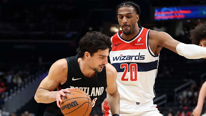 Jan 27, 2026; Washington, District of Columbia, USA; Portland Trail Blazers forward Deni Avdija (8) drives past Washington Wizards center Alex Sarr (20) during the second half at Capital One Arena. Mandatory Credit: Daniel Kucin Jr.-Imagn Images