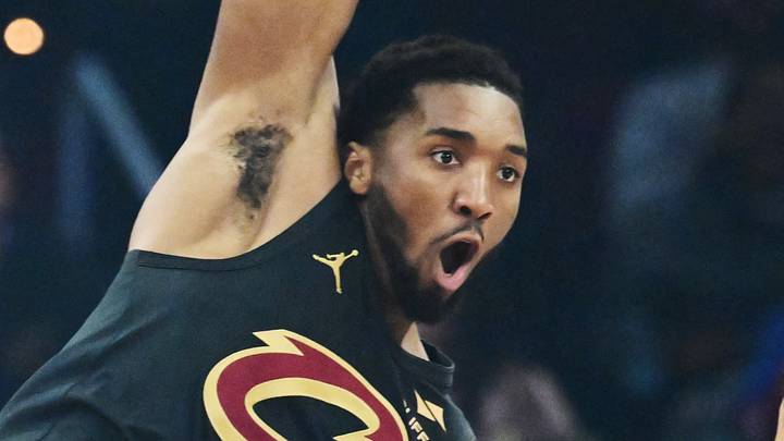 Feb 19, 2026; Cleveland, Ohio, USA; Cleveland Cavaliers guard Donovan Mitchell (45) reacts after a dunk during the first quarter against the Brooklyn Nets at Rocket Arena. Mandatory Credit: Ken Blaze-Imagn Images