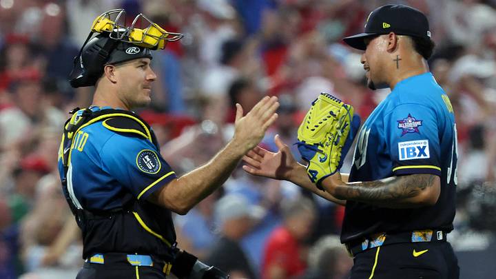 Jun 5, 2026; Philadelphia, Pennsylvania, USA; Philadelphia Phillies pitcher Jhoan Duran (59) and catcher J.T. Realmuto (10) shake hands after a win against the Chicago White Sox at Citizens Bank Park.